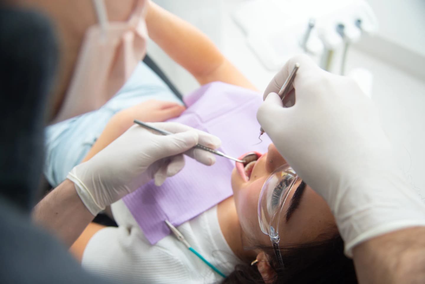 Dentist carrying out a gentle clinical examination