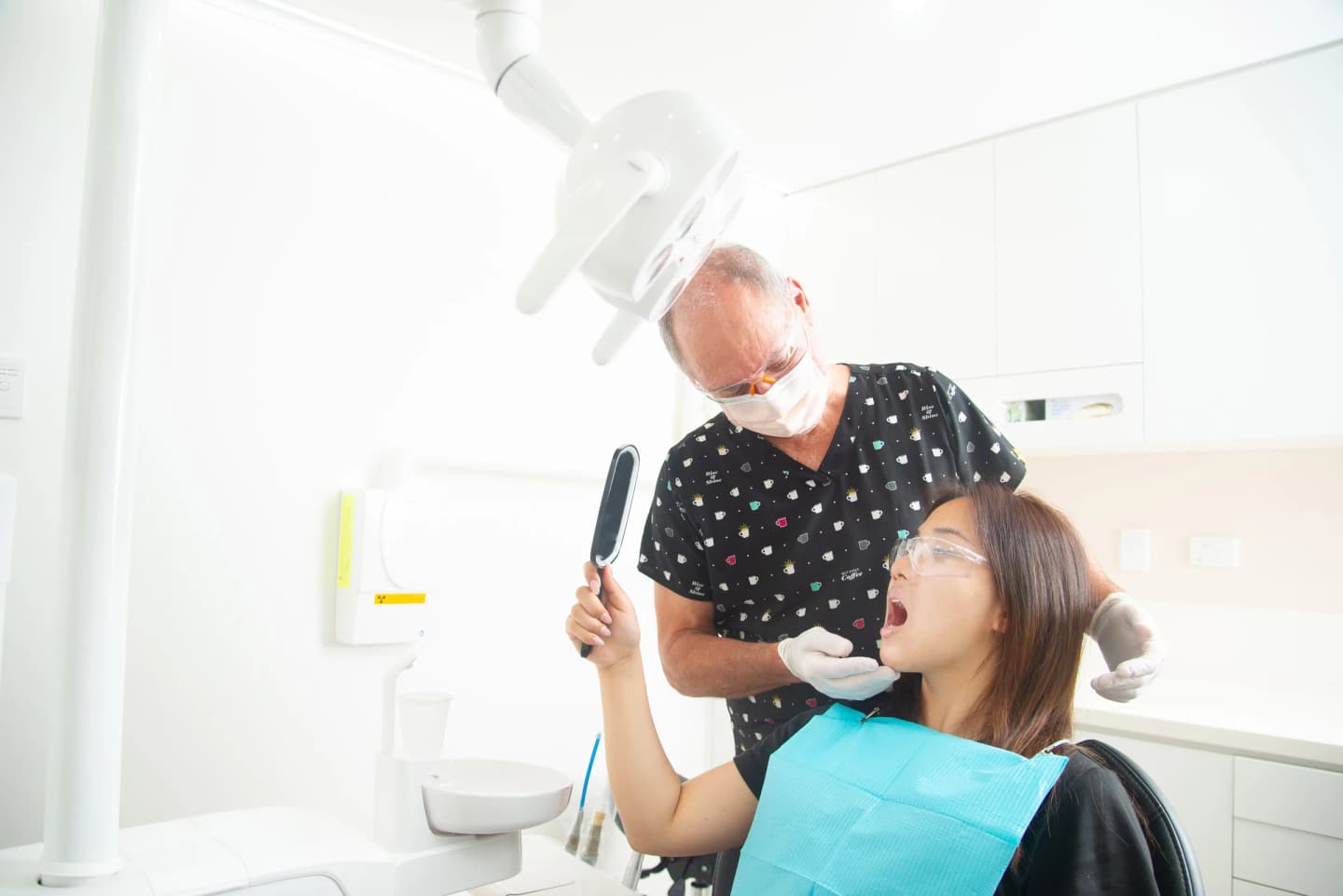 Dentist and patient discussing a dental examination