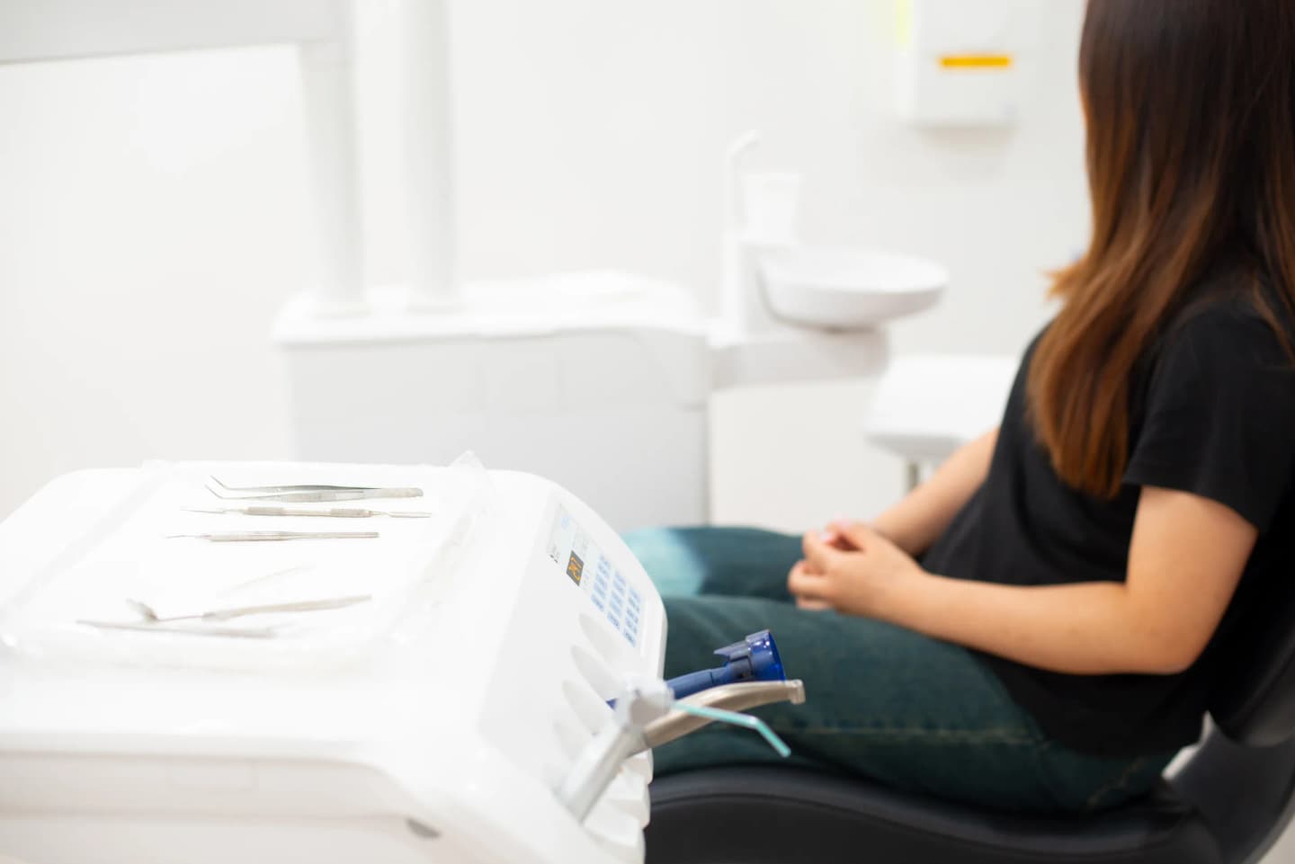 Patient seated calmly before treatment at Ivy Dental