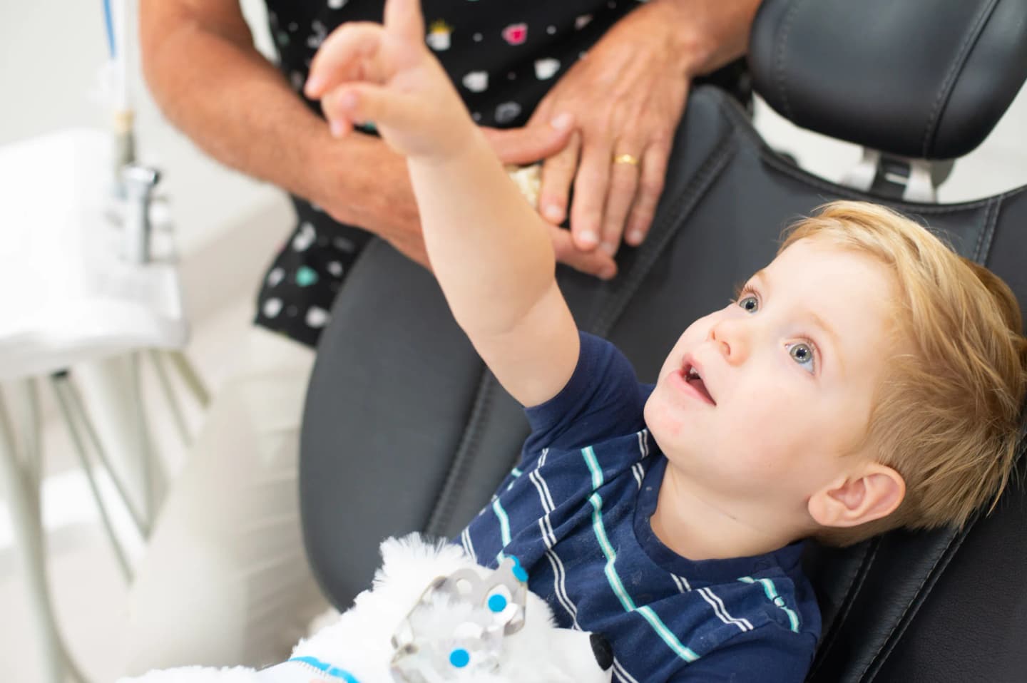 Child building trust with a dentist during an Ivy Dental visit